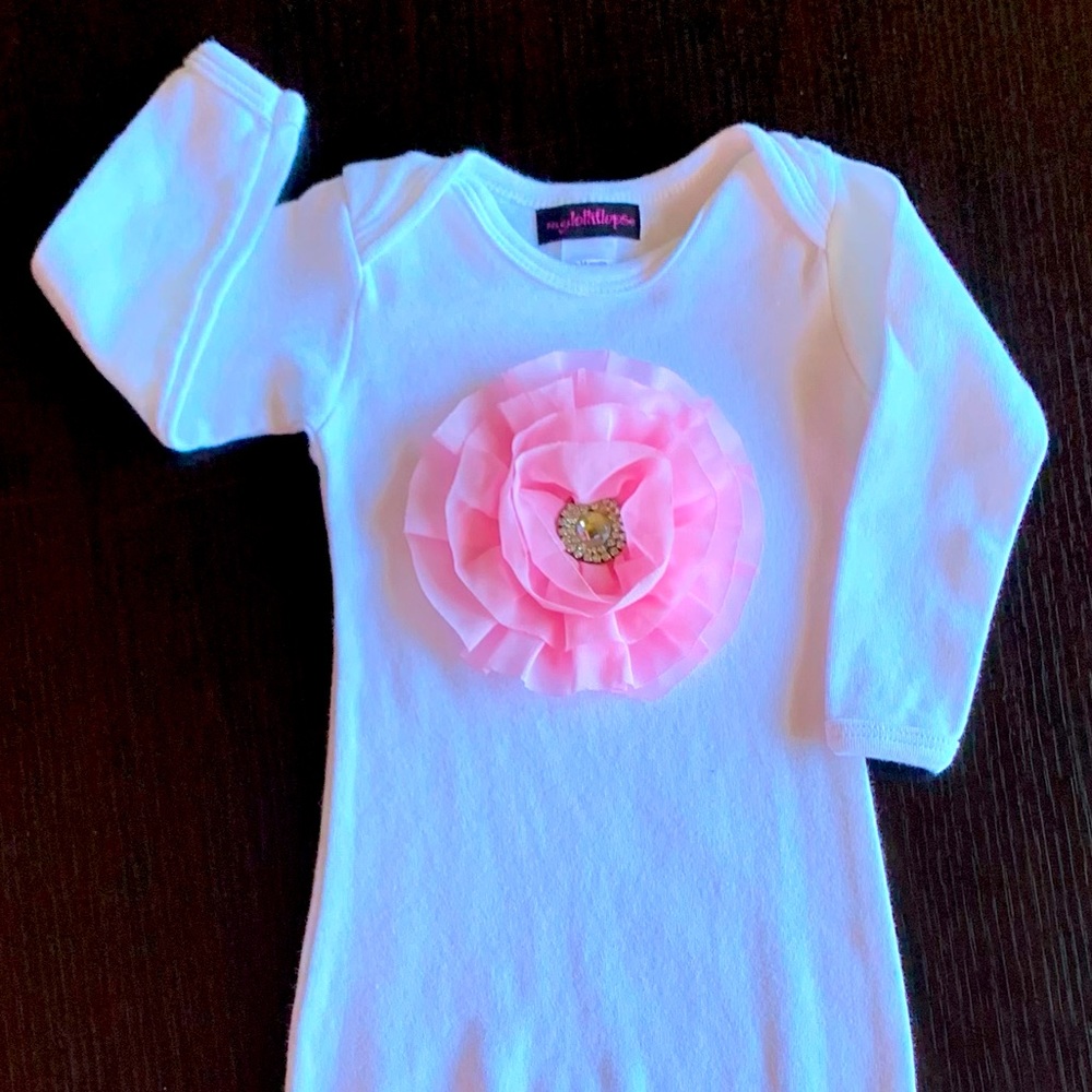 Bundle of adorable baby gowns